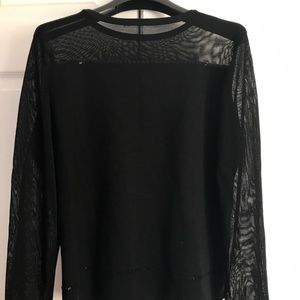 Beautiful Black light knit top with mesh detail